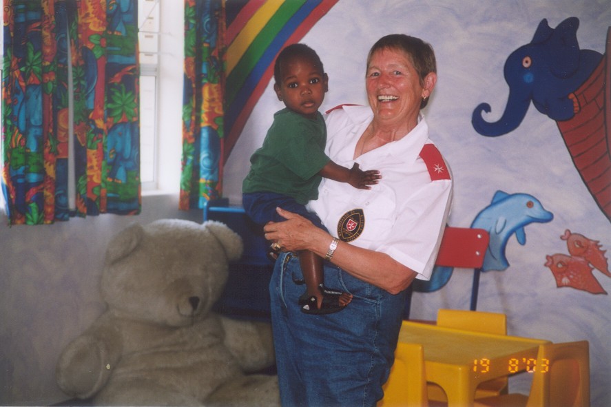 Albertine Sprenzinger-Sporer caring for a child at Blessed Gérard’s Children’s Home