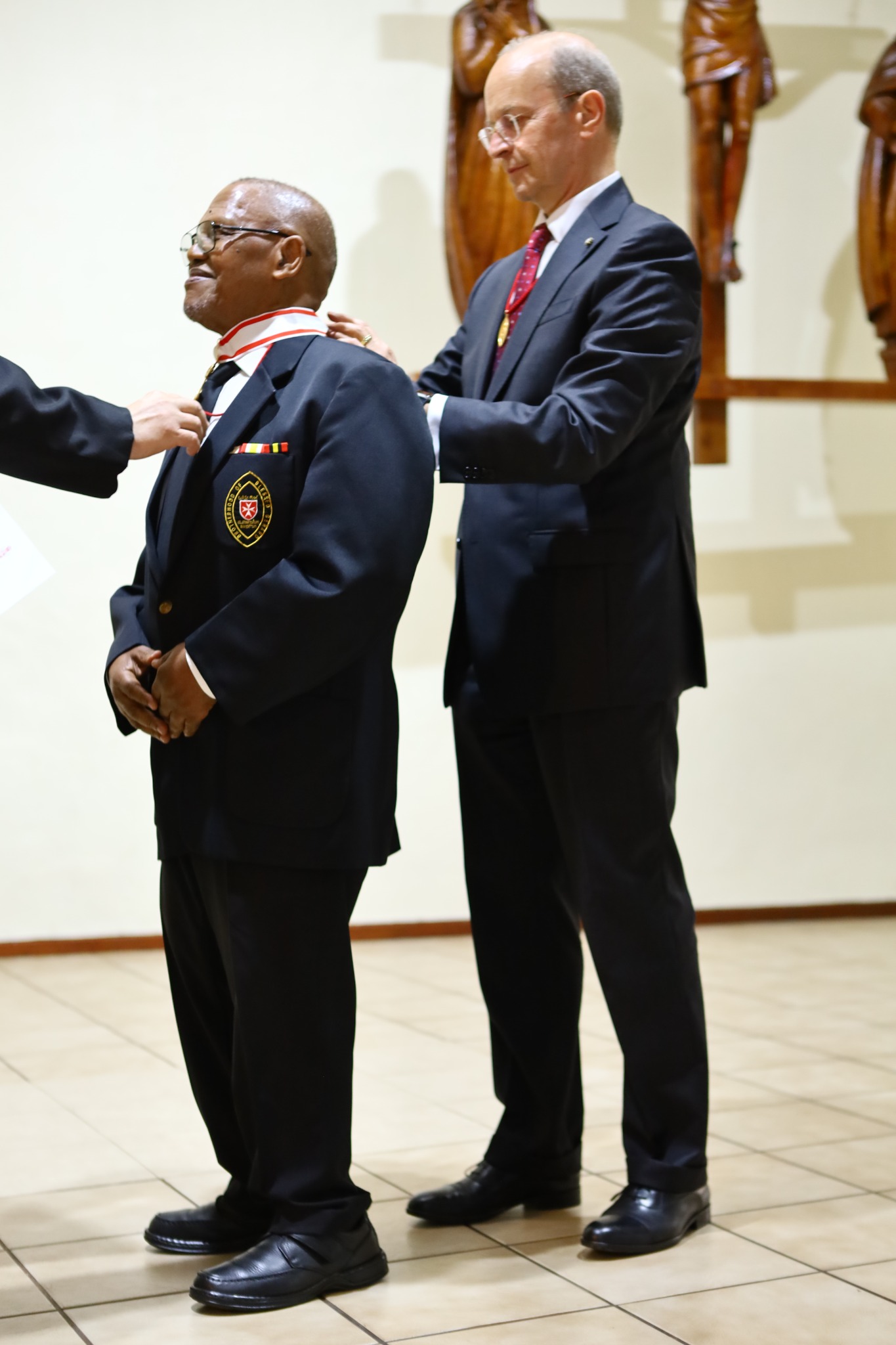 Major General Dr Josef D. Blotz presenting Dr Paul Thabethe with the Commander's Cross pro Merito Melitensi