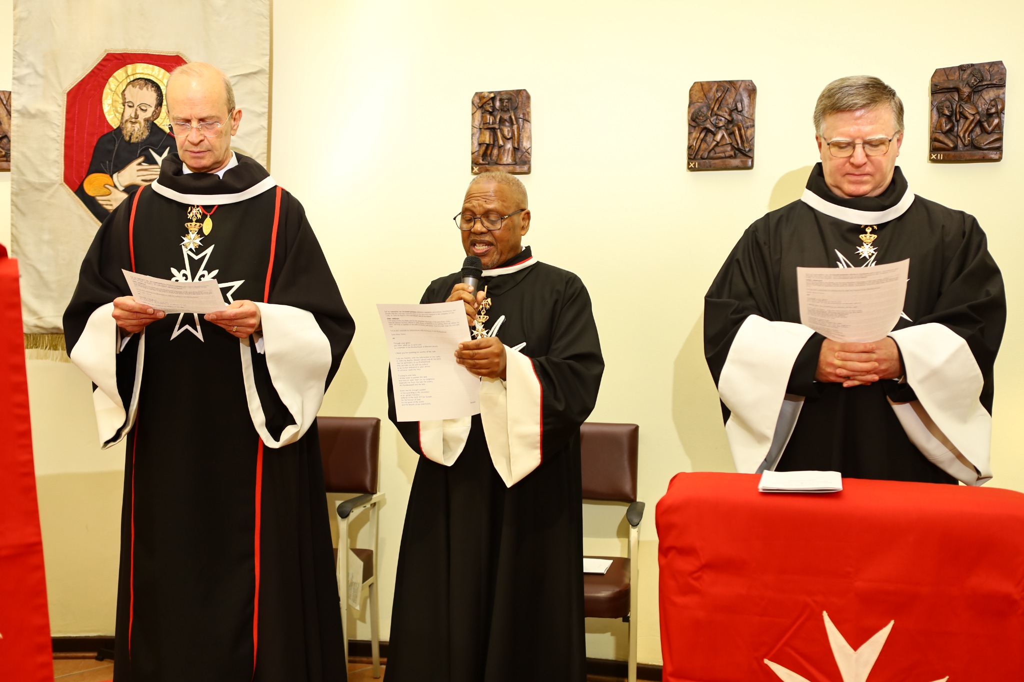 Major General Dr Josef D. Blotz taking part in prayer during the celebration