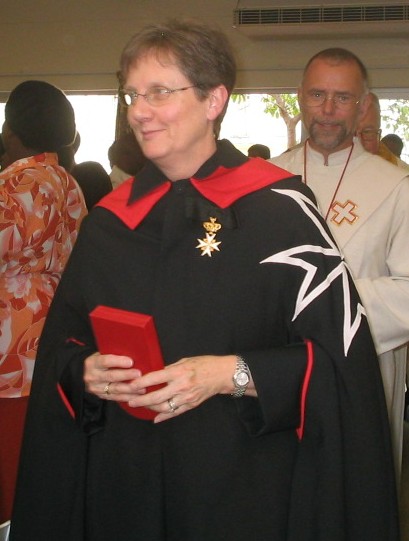 Clare Ann Kalkwarf in the robes of a Dame of Magistral Grace