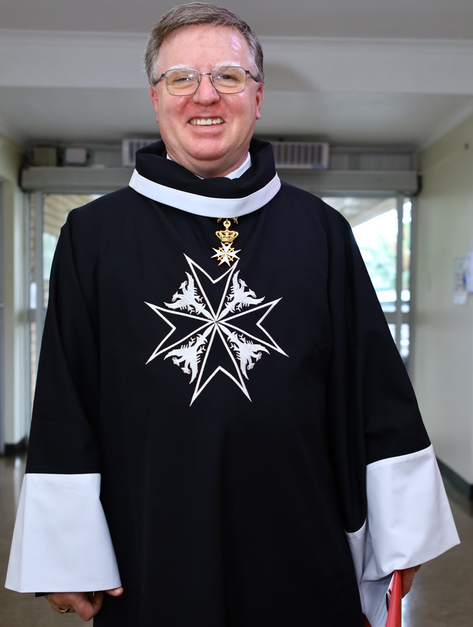 Dr Douglas Patrick Ross in the robes of a Knight of Magistral Grace