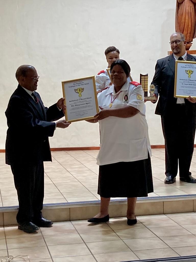 Khanyi Eunice Ngema receiving the President’s Employee of the Year Award for 2022