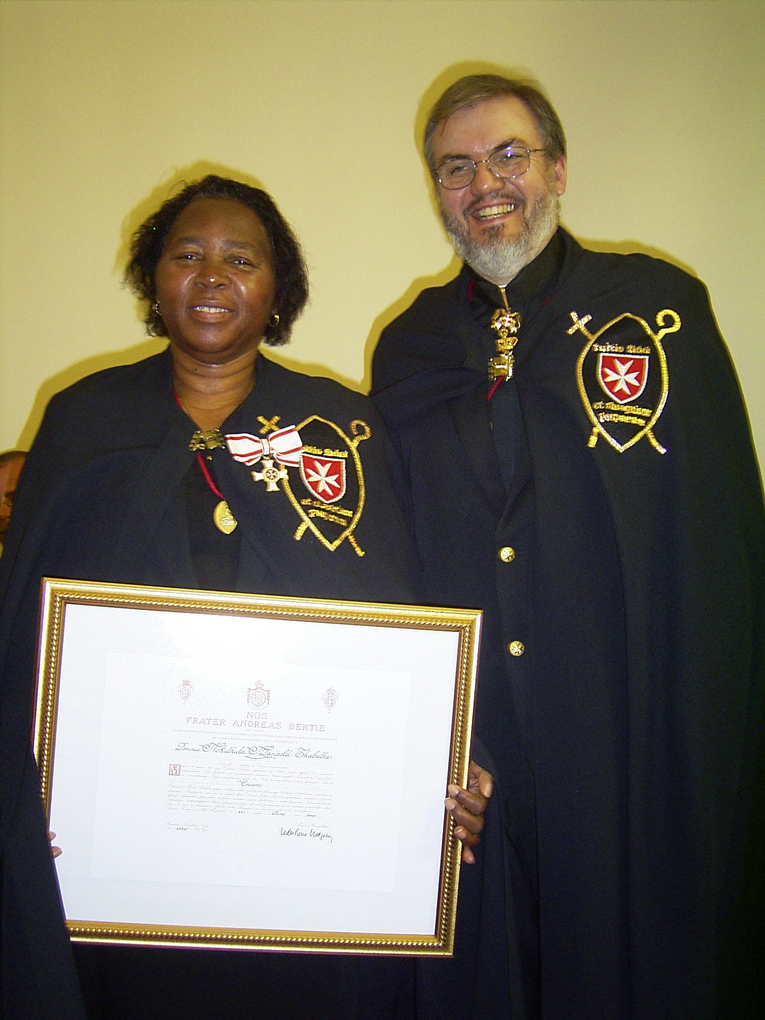 Nokuthula Thabethe with her Cross pro Merito Melitensi and certificate
