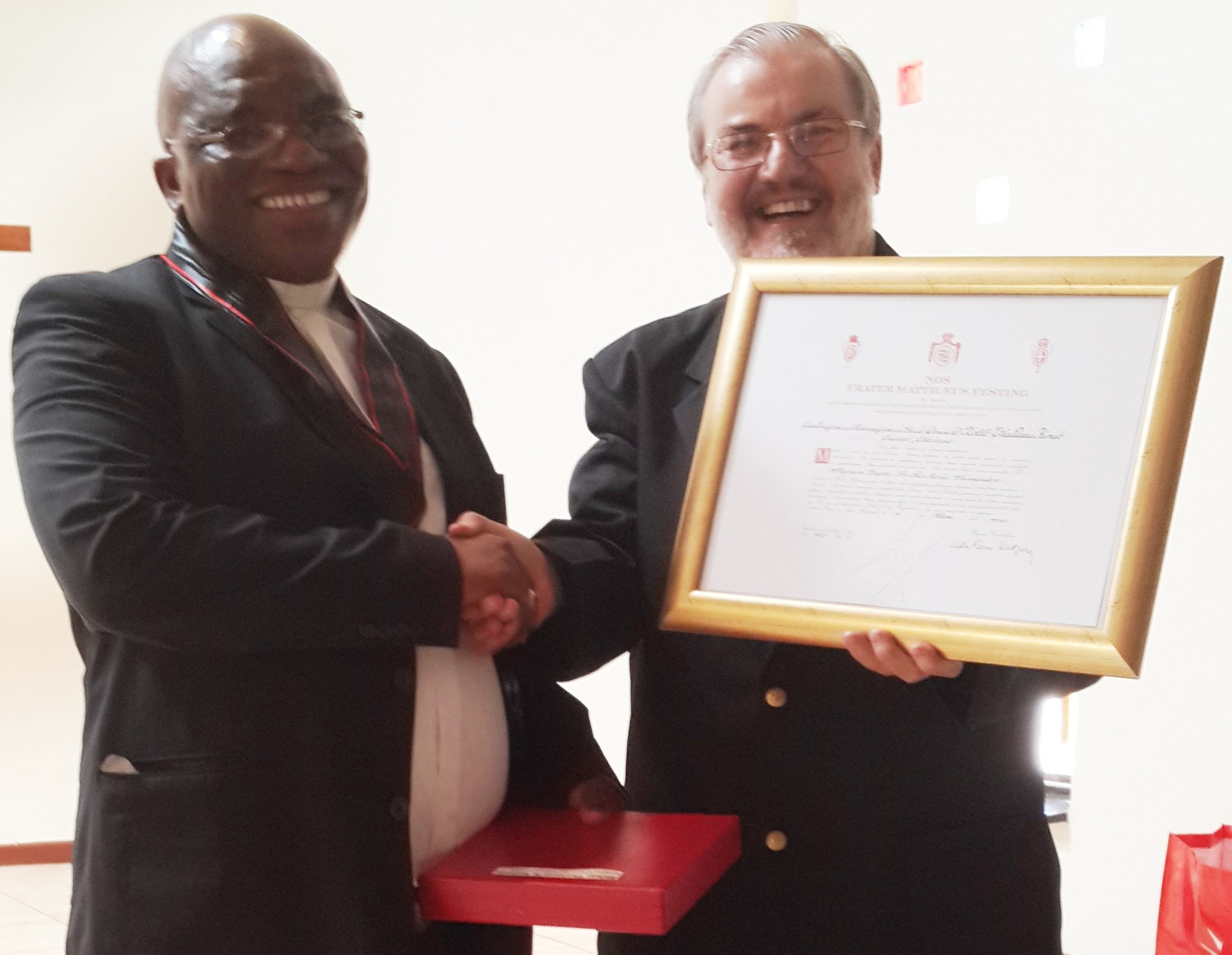 Bishop Xolelo Thaddeus Kumalo receiving the Grand Cross pro piis meritis