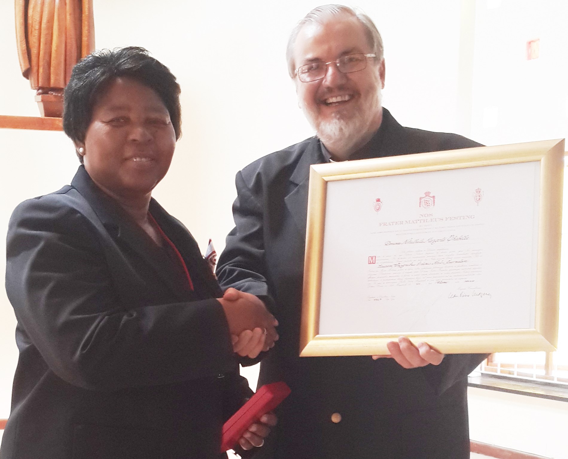 Nokuthula Thabethe receiving the Cross with Shield pro Merito Melitensi