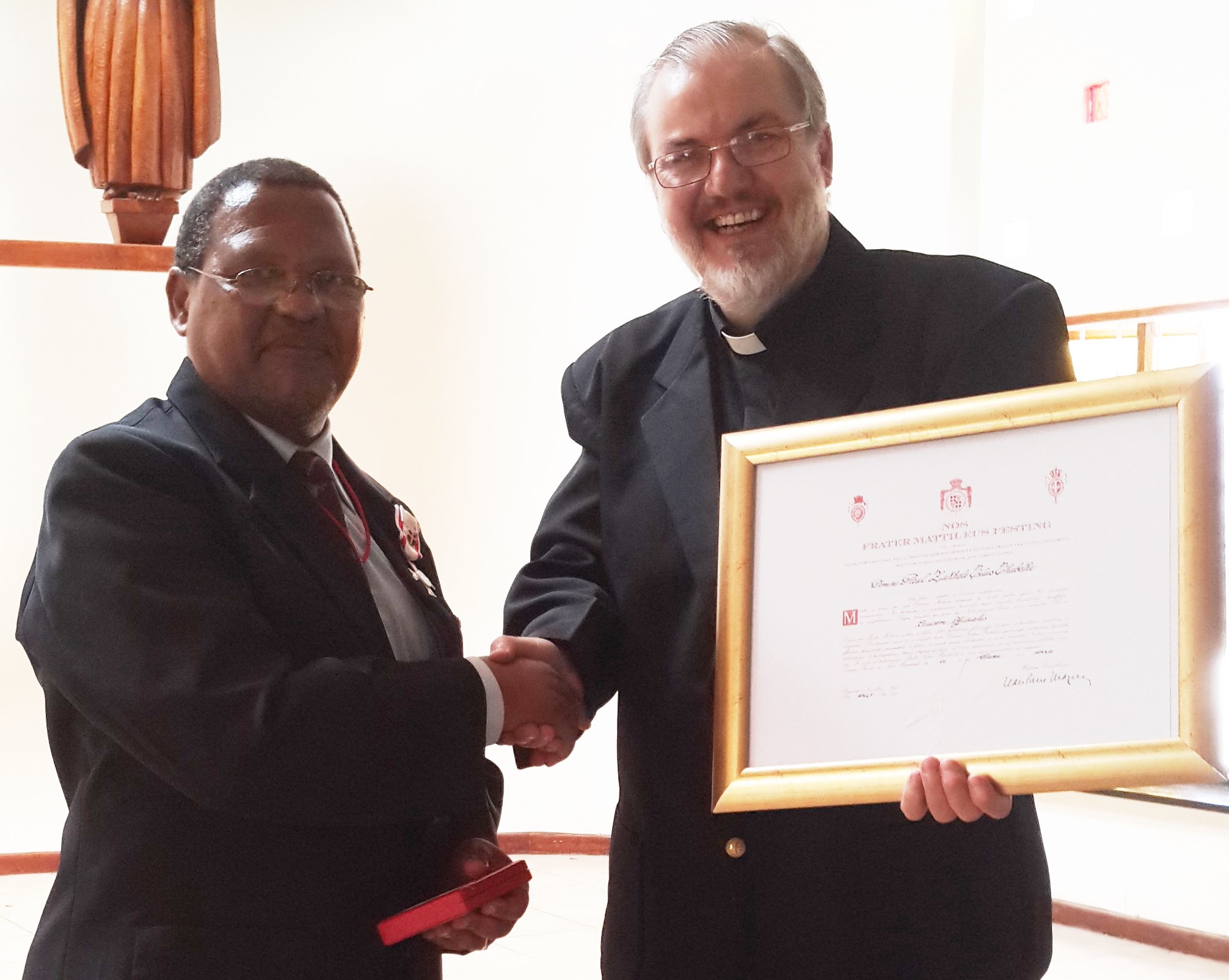 Dr Paul Thabethe receiving the Officer's Cross pro Merito Melitensi