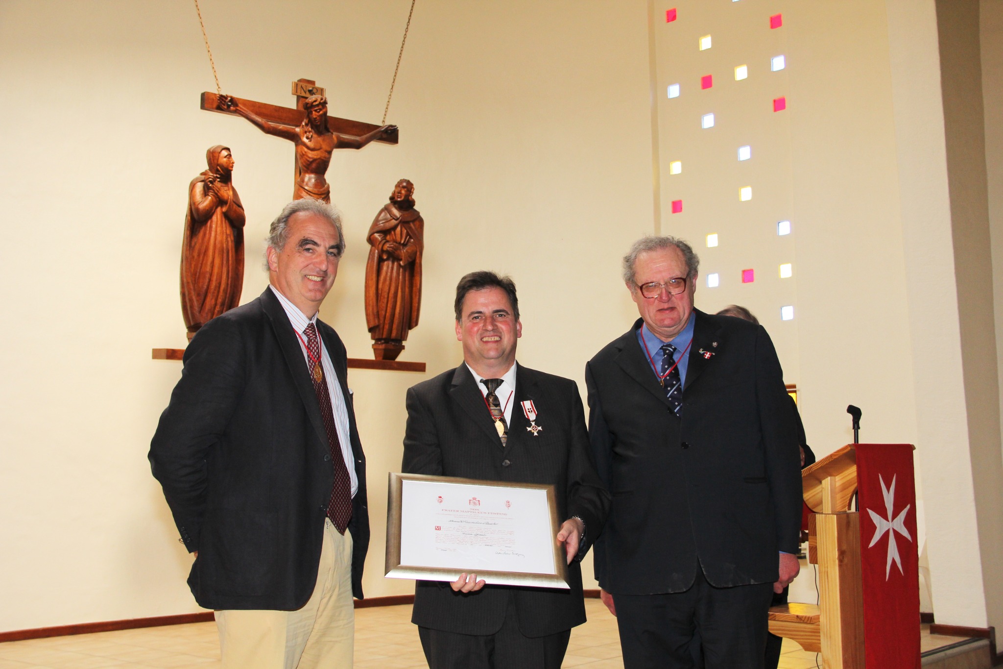 Maximilian Rauecker with the Officer's Cross pro Merito Melitensi and certificate